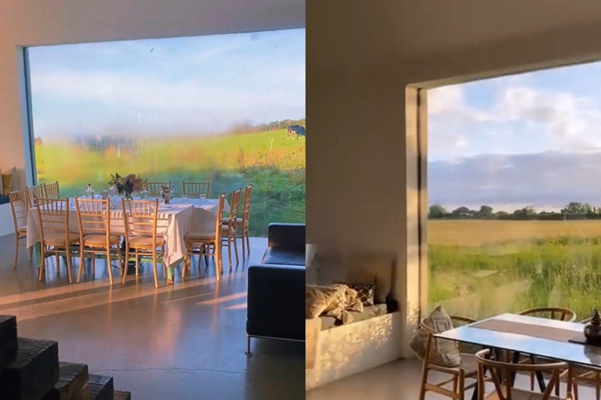 Женщина живет в доме с панорамными окнами