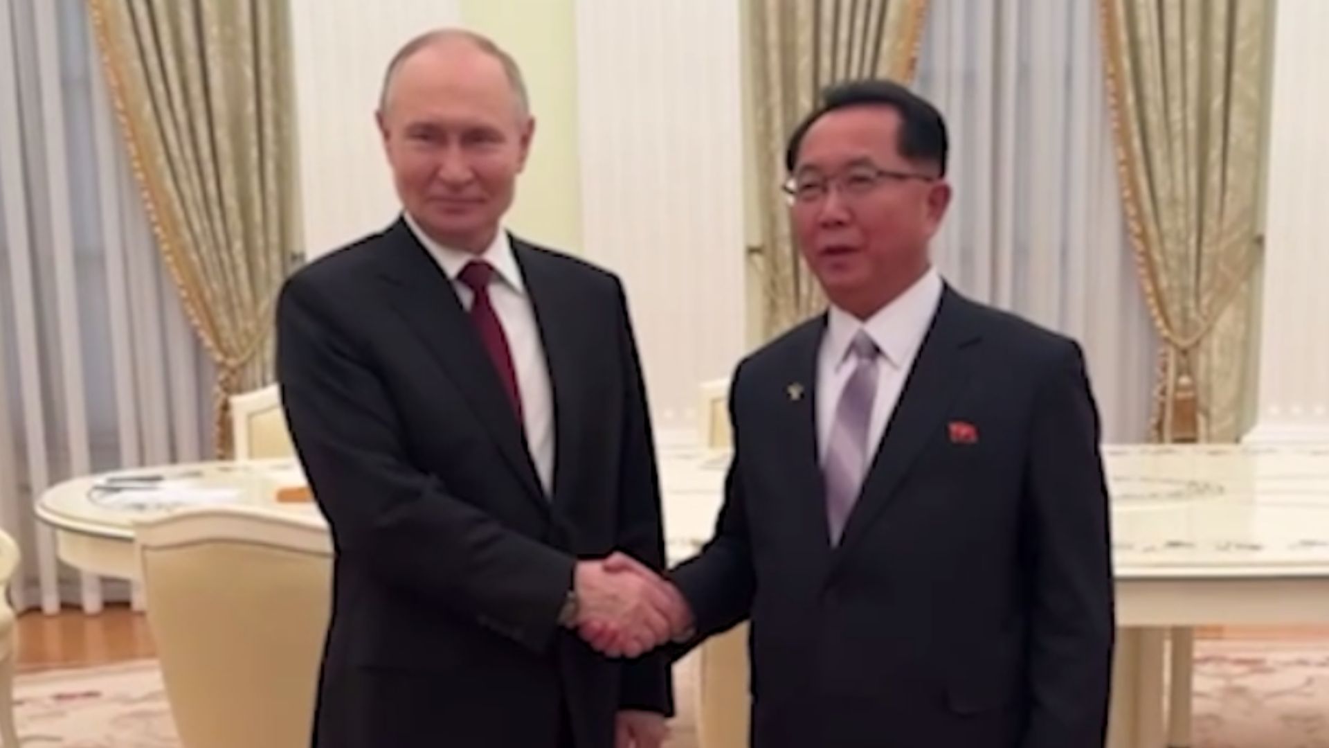 Путін і Лі Хі Йон Путін і Лі Хі Йон