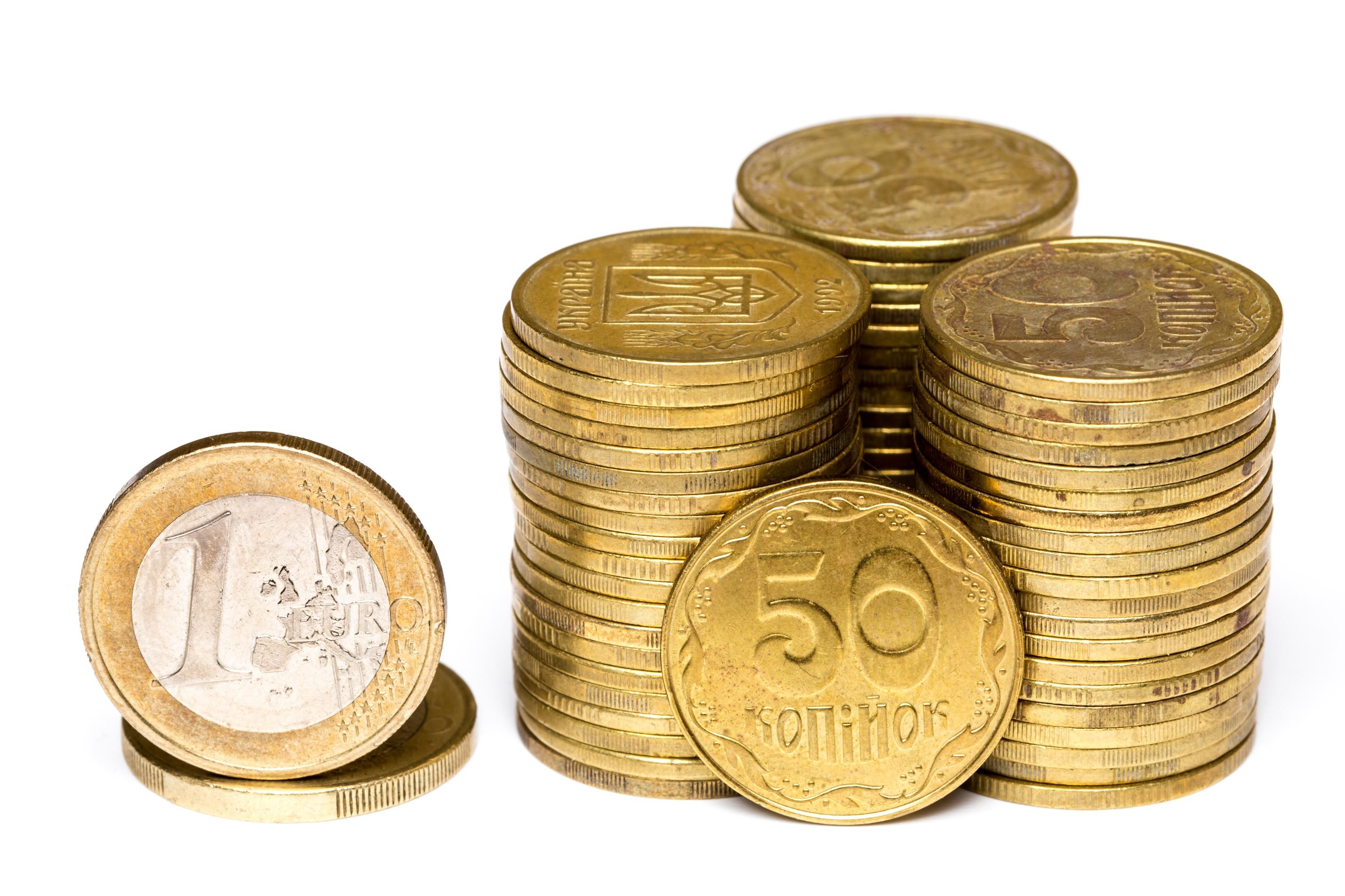 Монети номіналом 50 копійок та 1 євроцент