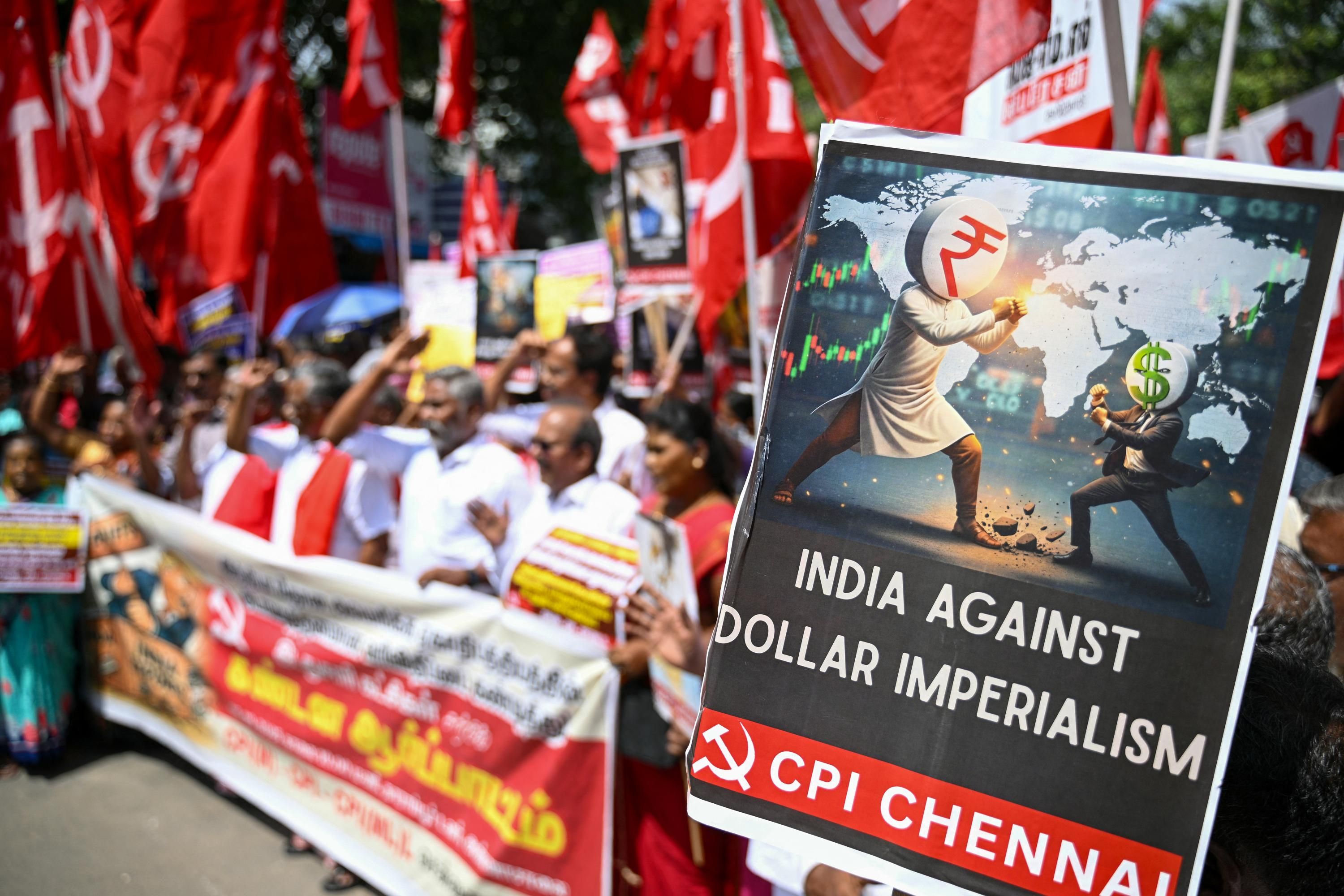 Активісти Комуністичної партії Індії протестують проти президента США Дональда Трампа Активісти Комуністичної партії Індії протестують проти президента США Дональда Трампа