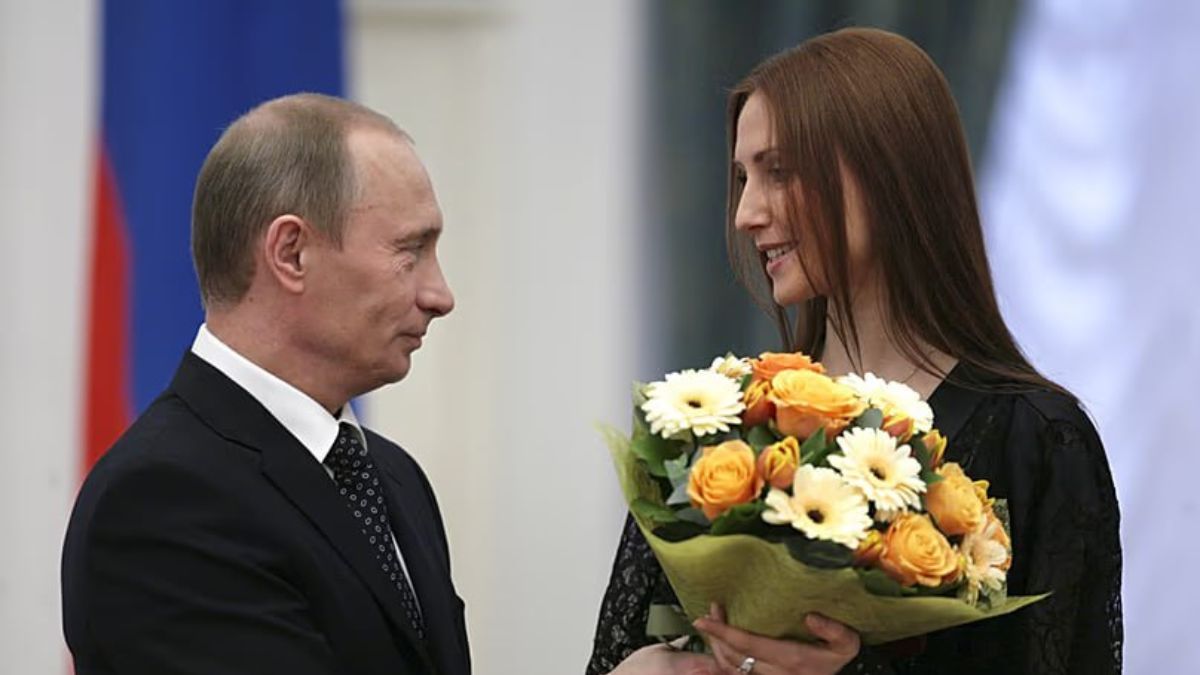 Владимир Путина и Светлана Захарова Владимир Путина и Светлана Захарова