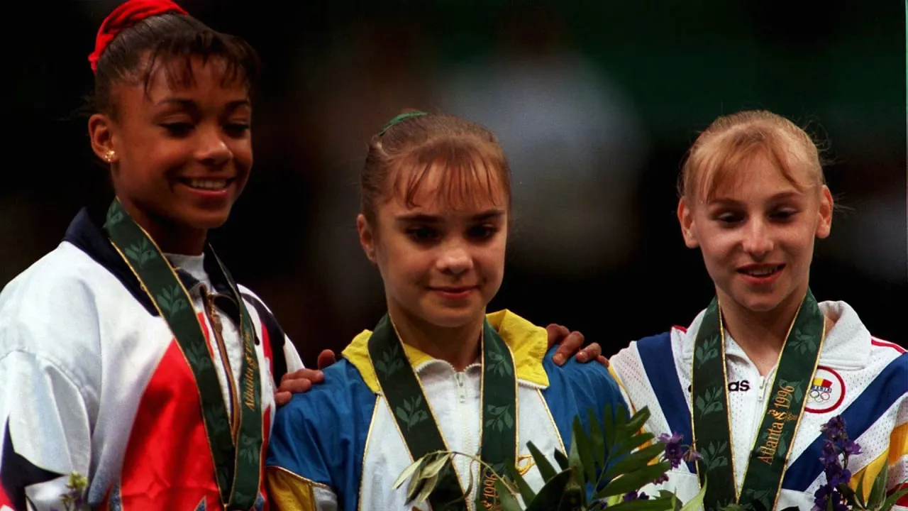 Лілія Подкопаєва на п'єдесталі Олімпіади-1996 Лілія Подкопаєва на п'єдесталі Олімпіади-1996