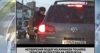 Нетрезвый водитель Volkswagen покатал инспектора на дверце