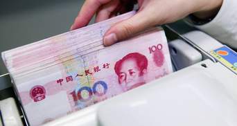 Китай выводит цифровой юань на новый уровень: какие возможности получат иностранцы