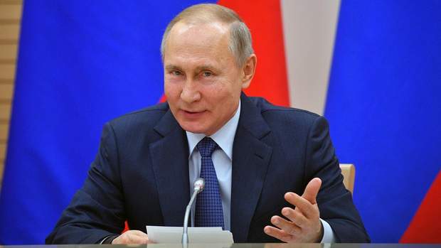путін